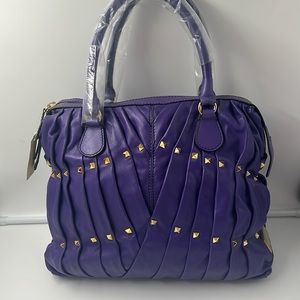 Brand new Valentino Garavani bag. NWT. This bag is in pristine condition.